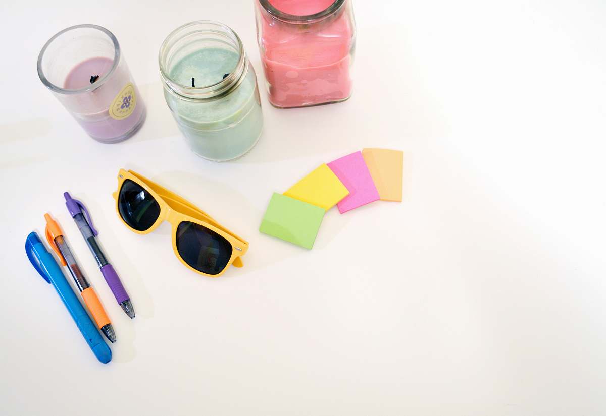 learning english black wayfarer sunglasses with yellow plastic frames table